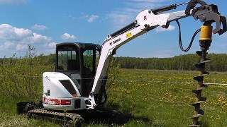 Аренда экскаватора погрузчика с ямобуром в Кингисепп цена от 1575 руб
